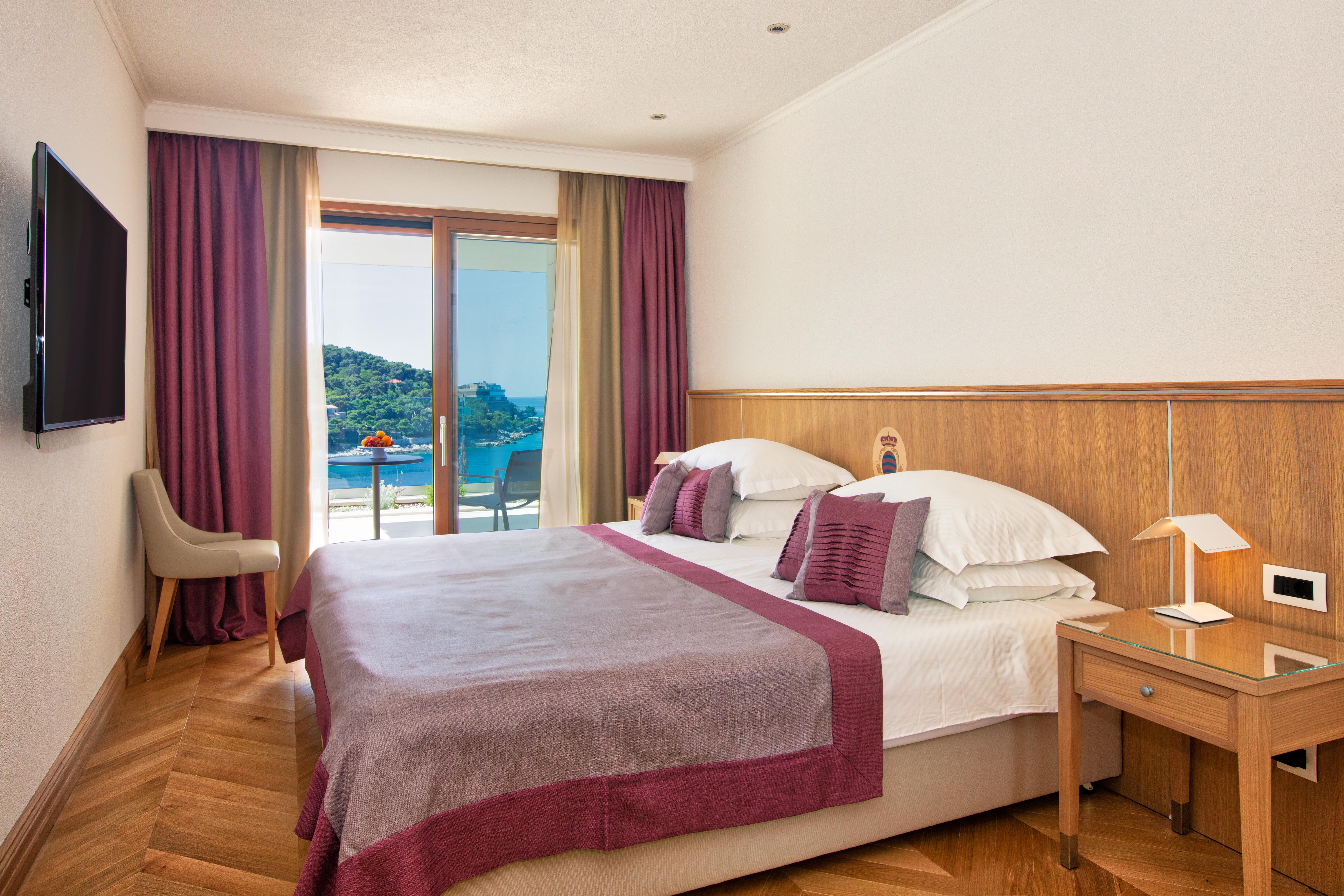 호텔 모어 두브로브니크 외부 사진 A bedroom at the Hotel de la Paix